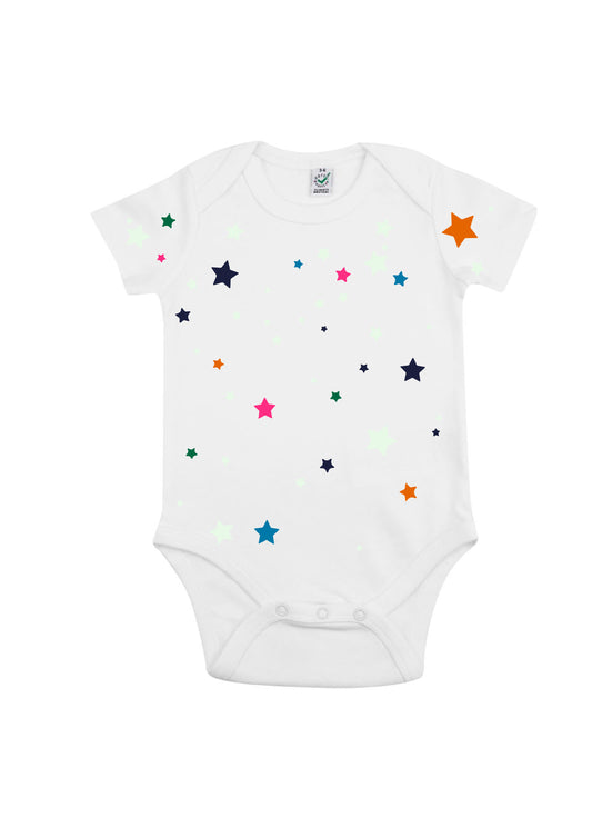 White babygrow with multi colour printed stars.